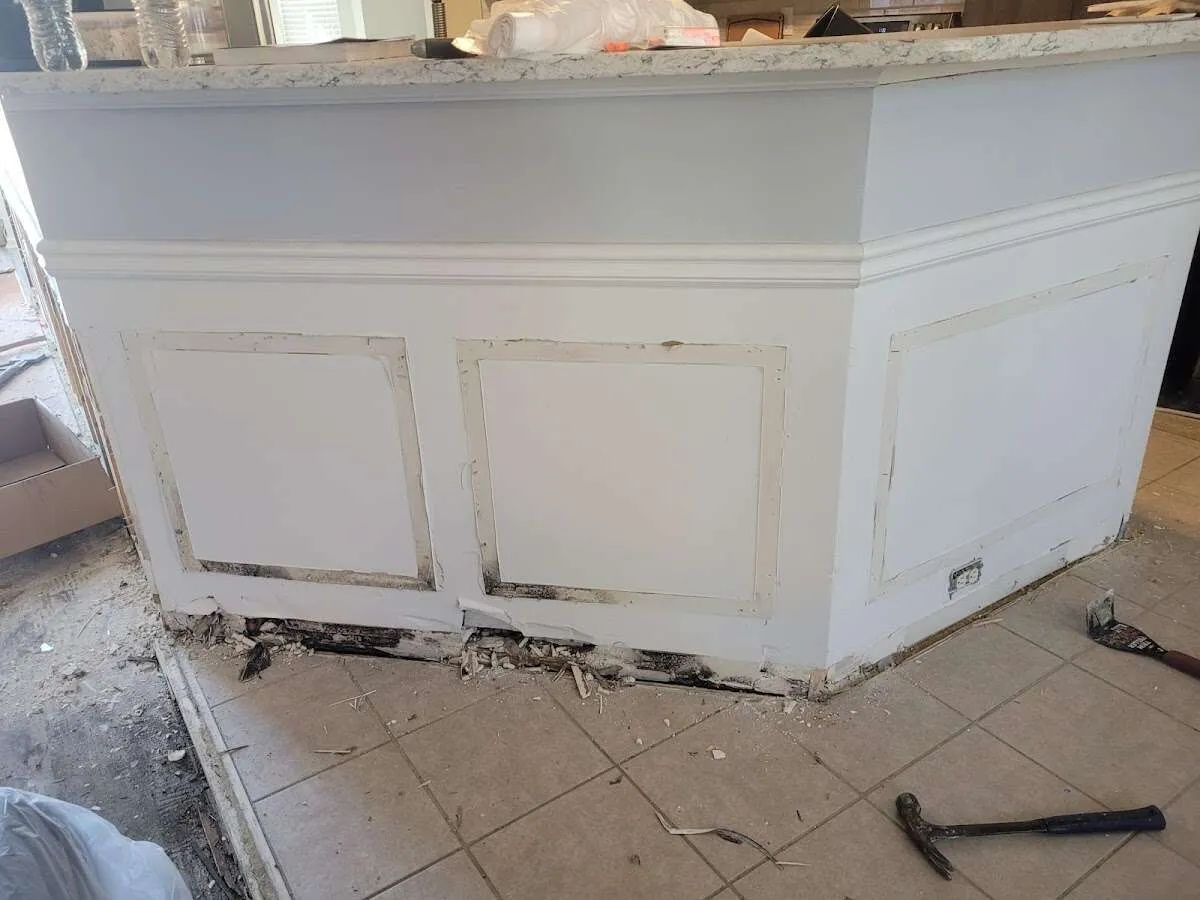 Water damage and mold on kitchen during Storm Damage Restoration in El Rio